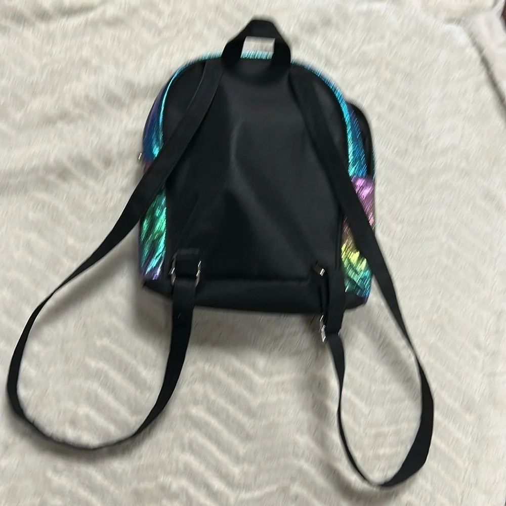 Justice Letter (F) fierce-brave-amazing iridescent color backpack EUC